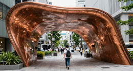 sculptural copper canopy tops micro-landmark community hub in tokyo by nikken sekkei
