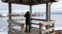 timber observation tower reinterprets kola bay’s industrial shoreline in russia